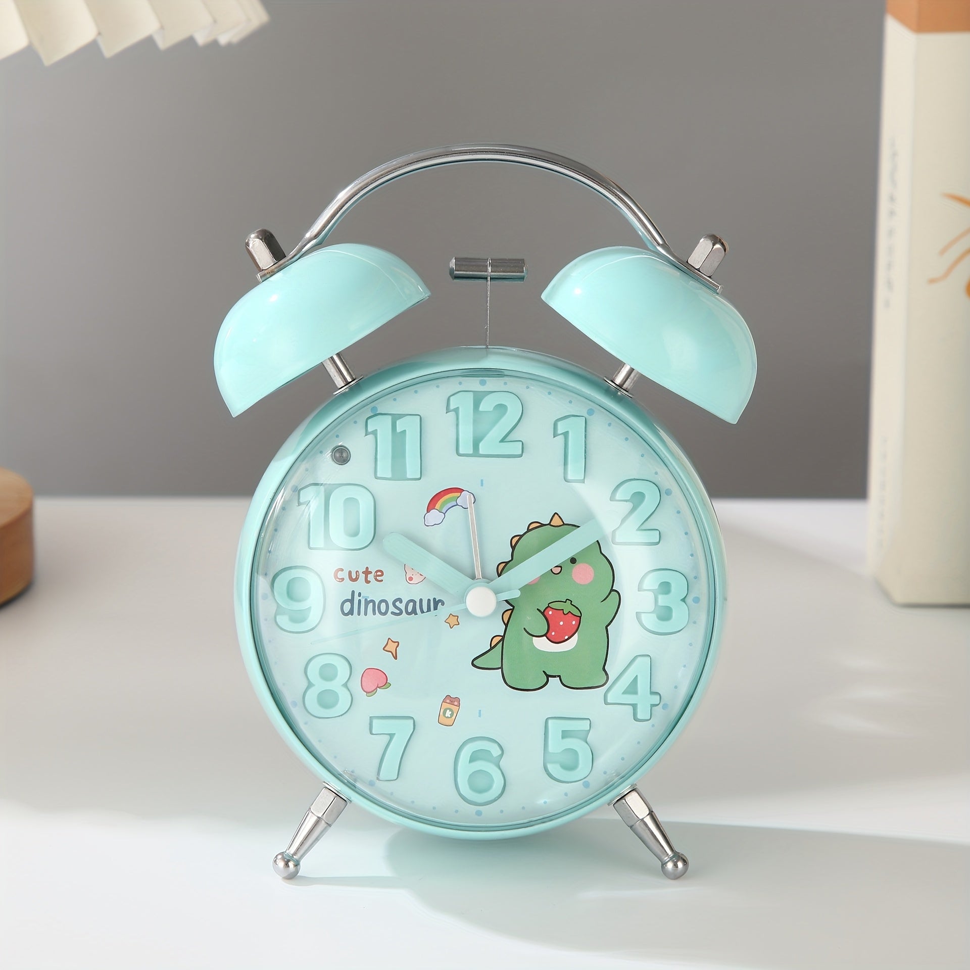A Novel And Artistic Convex Cartoon Alarm Clock, Tailored for Students, Featuring a Stereo Dial That Is Visually Appealing And Easy to Read. It Operates Silently to Avoid Disturbing Sleep