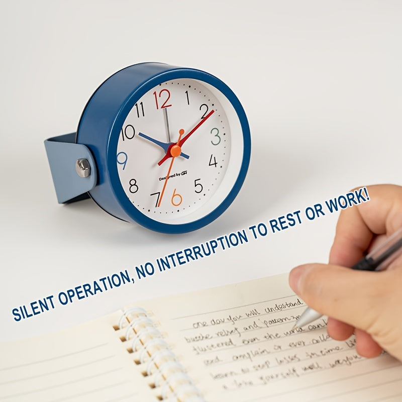 This Is Not Merely an Alarm Clock, But a Minimalist Decorative Piece That Effortlessly Complements Your Bedroom, Office Or Dormitory. Its Metal Casing Lends It a Stylish Appearance, Operates Silently, And Is Battery-Powered (Batteries Not Included)