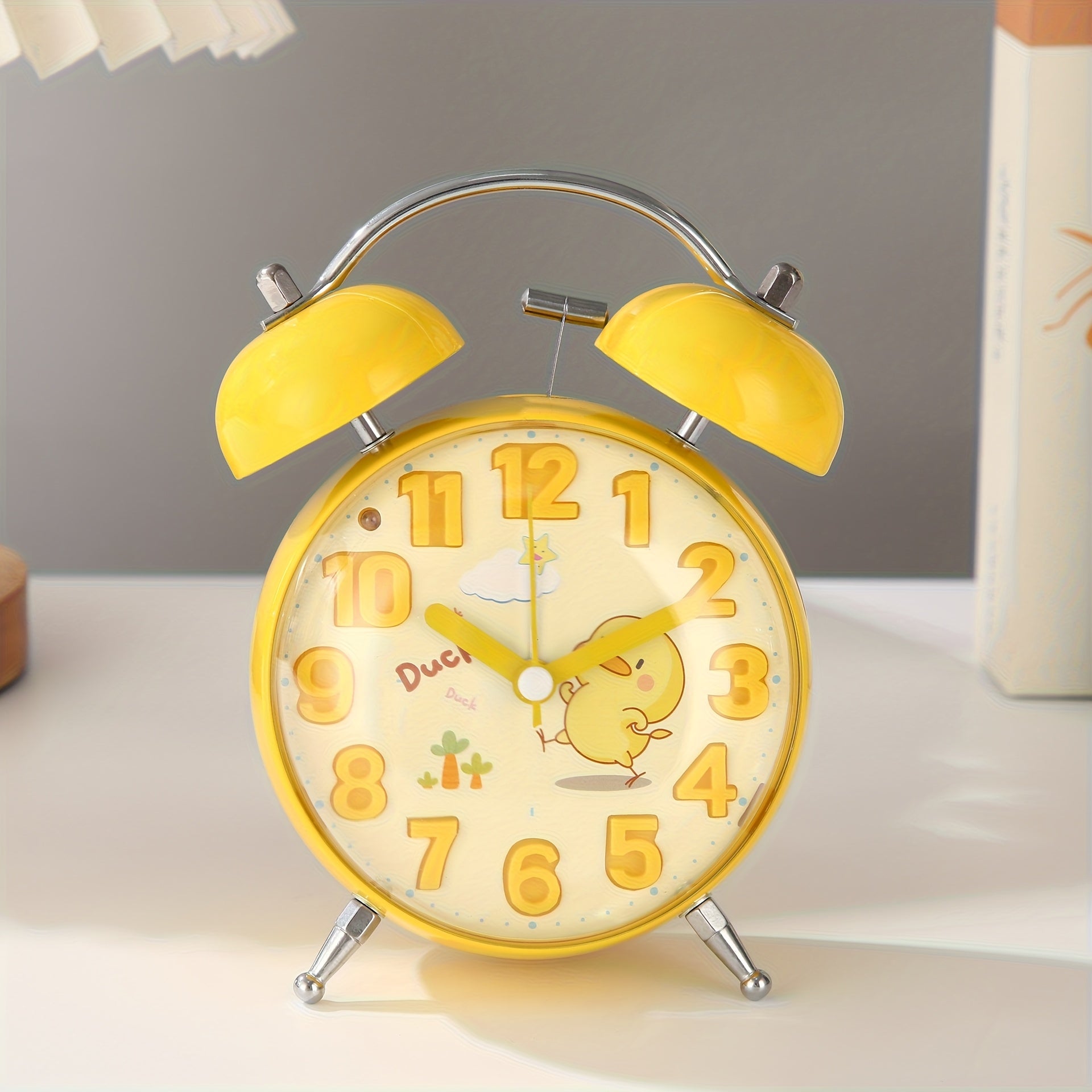 A Novel And Artistic Convex Cartoon Alarm Clock, Tailored for Students, Featuring a Stereo Dial That Is Visually Appealing And Easy to Read. It Operates Silently to Avoid Disturbing Sleep