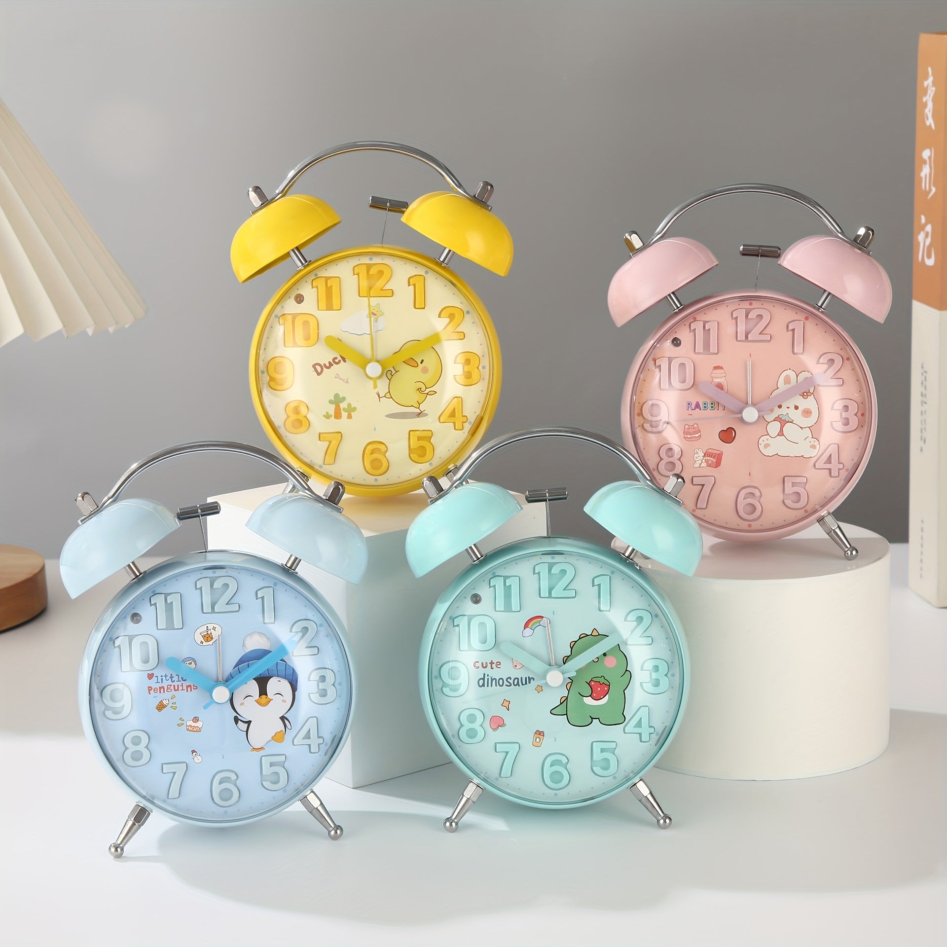 A Novel And Artistic Convex Cartoon Alarm Clock, Tailored for Students, Featuring a Stereo Dial That Is Visually Appealing And Easy to Read. It Operates Silently to Avoid Disturbing Sleep
